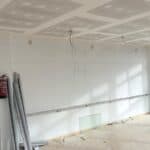 Tapado interior de agujeros Instalación de aislamiento térmico mediante insuflado en cámara de aire