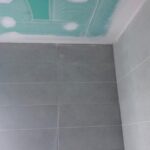 Tapado interior en banos1 Instalación de aislamiento térmico mediante insuflado en cámara de aire